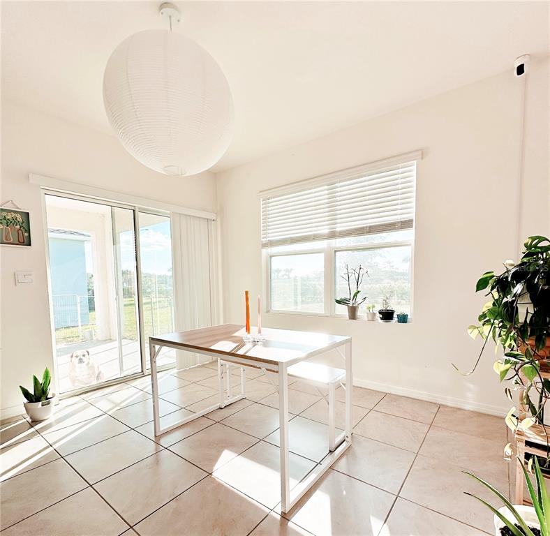 1122 Brimstone Circle Winter Haven, FL 33884 - Photo 6 of 17 a living room with a large window