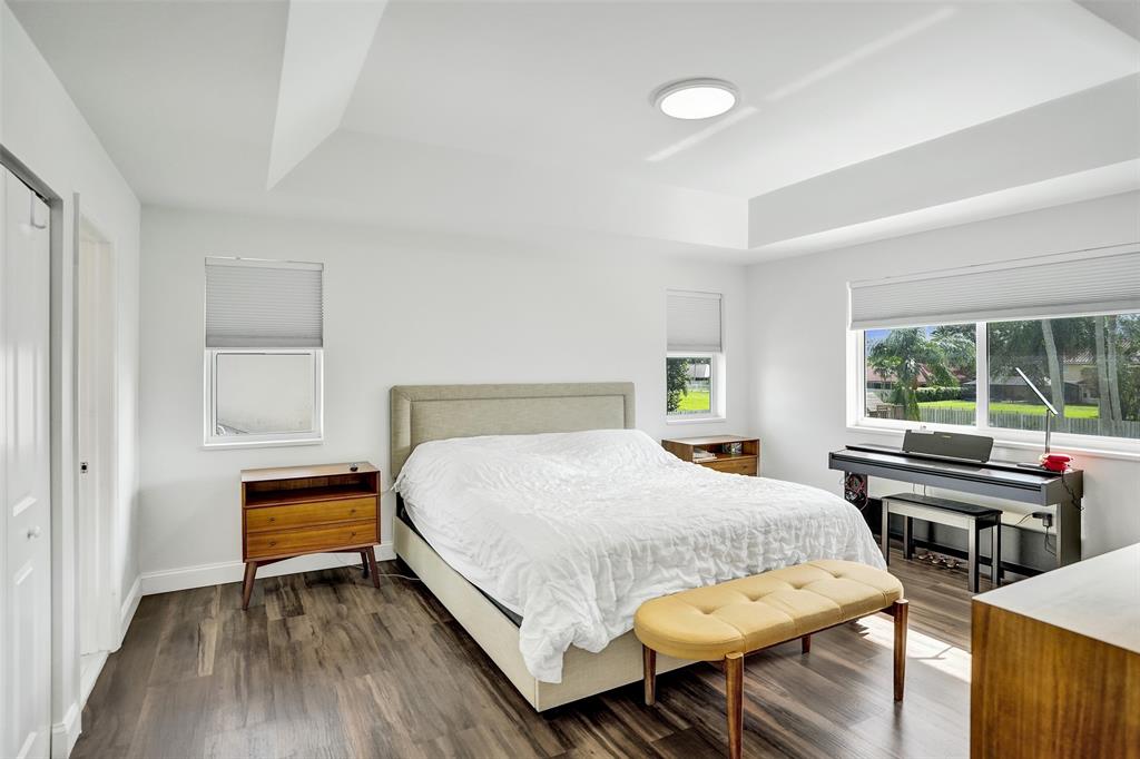 930 Greenbriar Avenue Davie, FL 33325 - Photo 15 of 28 a bedroom with a bed and a desk