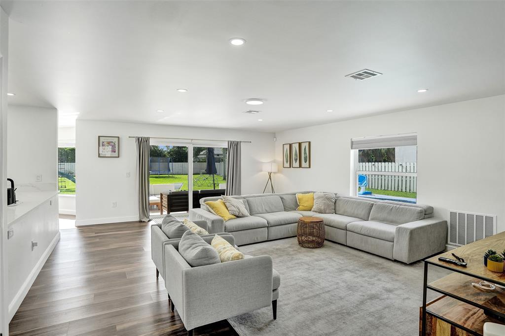 930 Greenbriar Avenue Davie, FL 33325 - Photo 17 of 28 a living room with furniture and a large window
