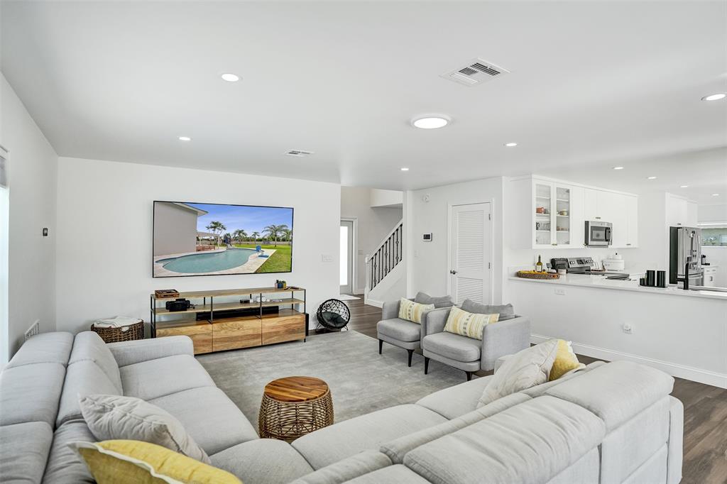 930 Greenbriar Avenue Davie, FL 33325 - Photo 18 of 28 a living room with furniture and a flat screen tv