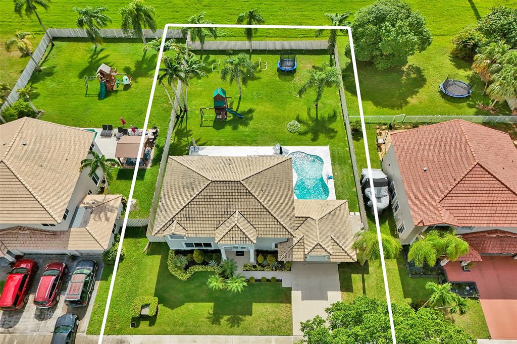 930 Greenbriar Avenue Davie, FL 33325 - Photo 22 of 28 an aerial view of a house