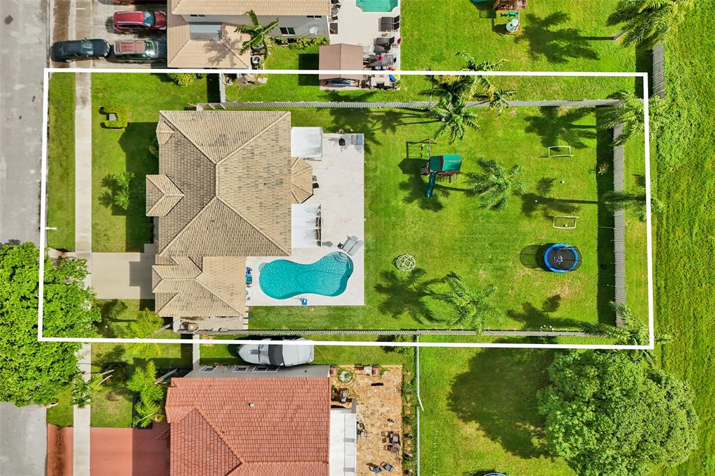 930 Greenbriar Avenue Davie, FL 33325 - Photo 24 of 28 view of an outdoor space with a lake view