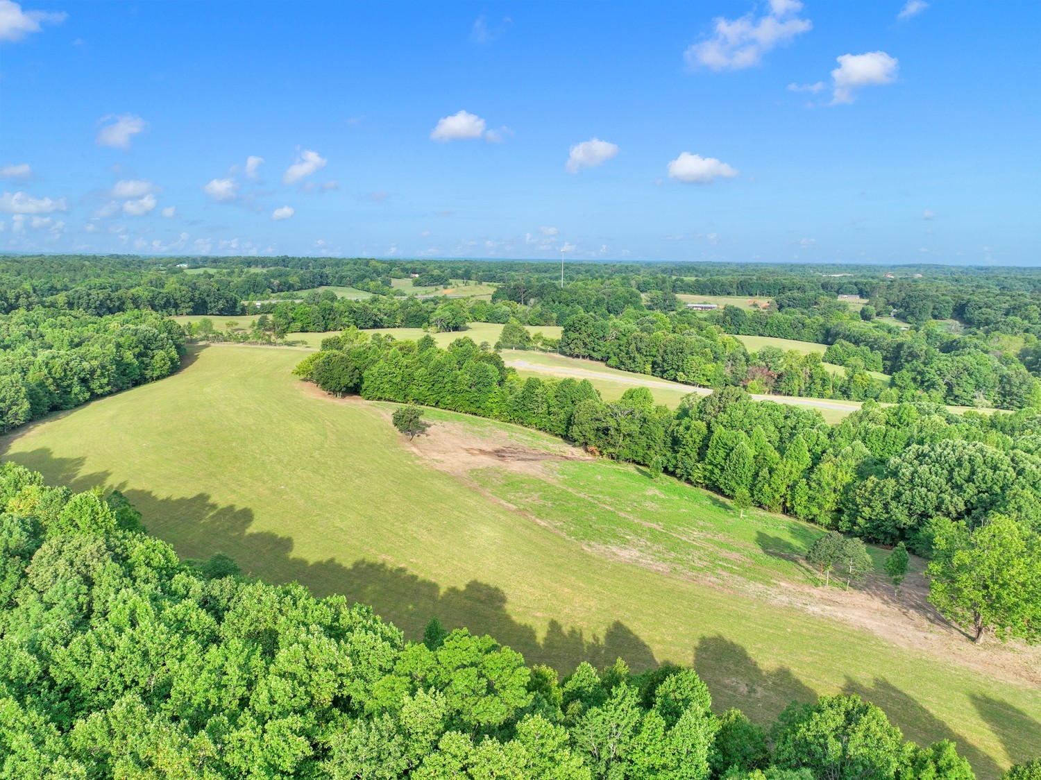 7740 Pewitt Road Franklin, TN 37064 - Photo 30 of 33 a view of a lake with a yard