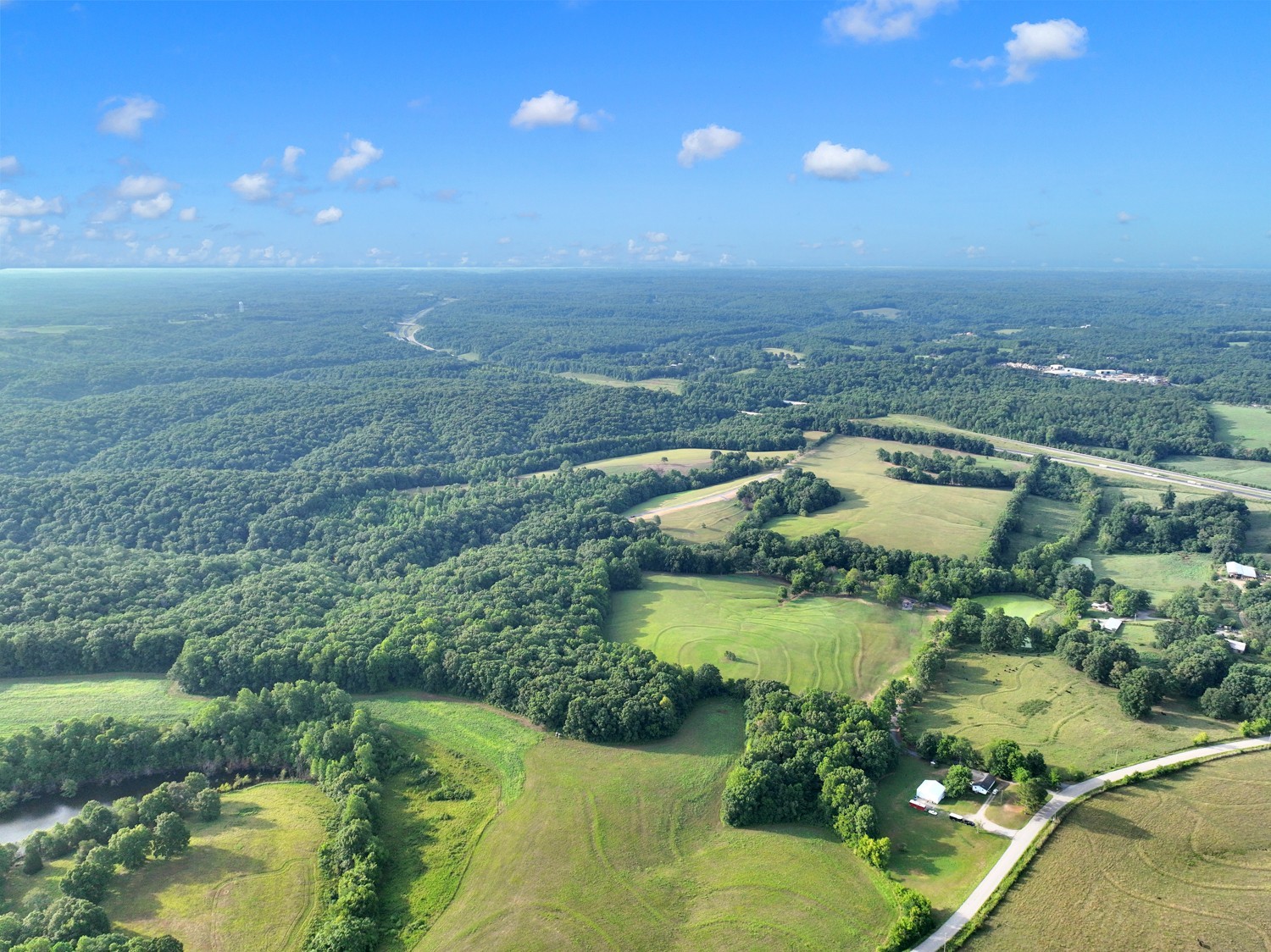7740 Pewitt Road Franklin, TN 37064 - Photo 33 of 33 an aerial view of residential houses with outdoor space and lake view