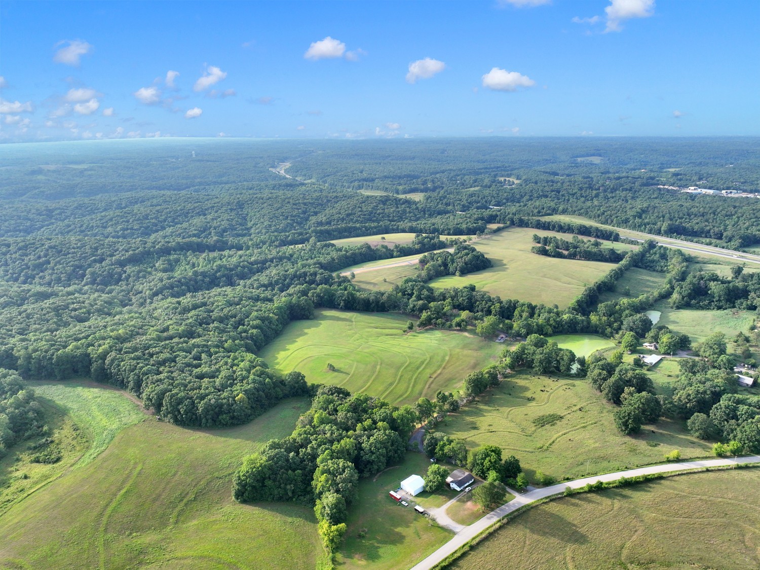 7740 Pewitt Road Franklin, TN 37064 - Photo 7 of 33 a view of a swimming pool with a yard