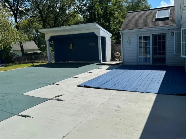 a view of a backyard of the house