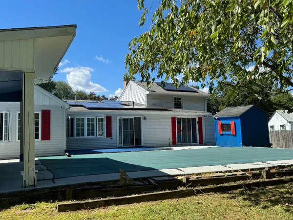 a view of swimming pool with a yard