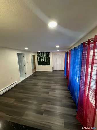 a view of a room with a chandelier