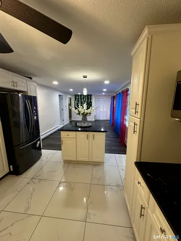 $469,900 | 24 Bel-Aire Circle, Windsor Locks, CT 06096