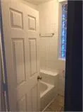 a bathroom with a bathtub