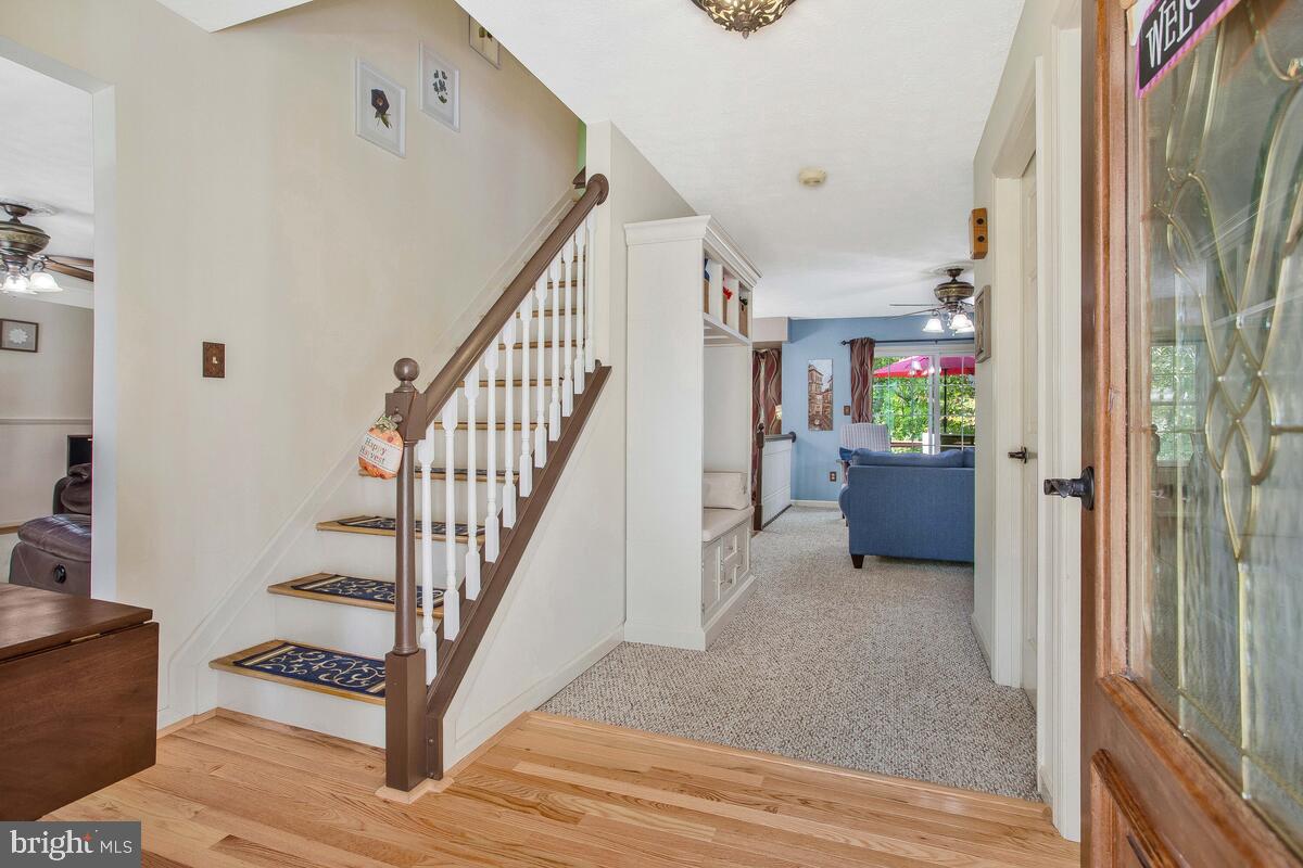 165 Ball Road St. Leonard, MD 20685 - Photo 8 of 55 a view of entryway and hall with wooden floor