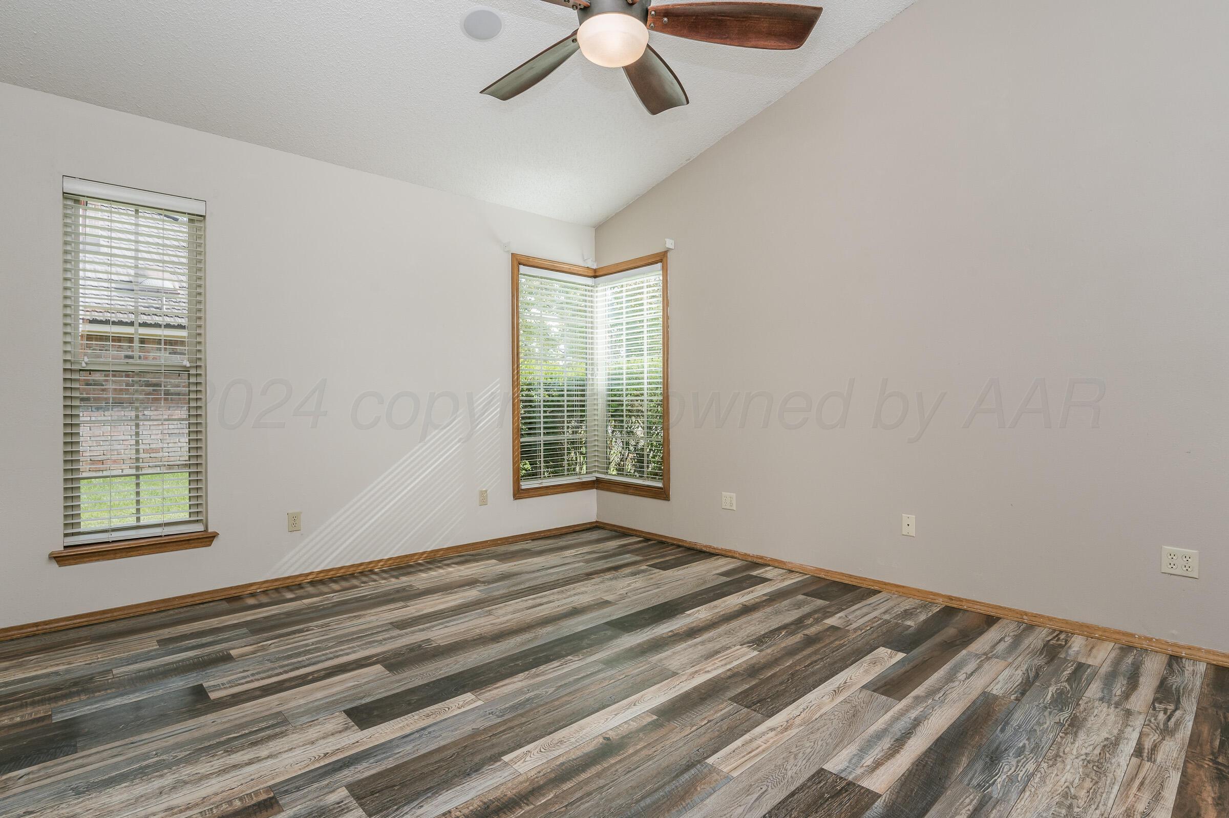 7212 Dukes Place Amarillo, TX 79109 - Photo 11 of 21 a view of an empty room with a window and closet