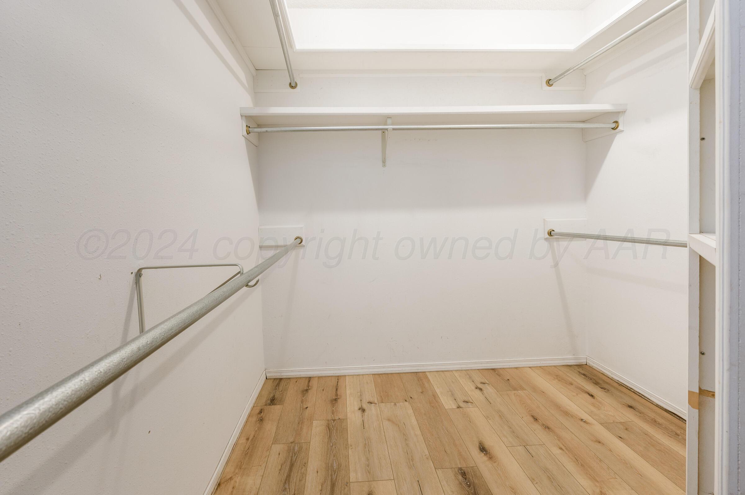 7212 Dukes Place Amarillo, TX 79109 - Photo 14 of 21 a view of an empty walk in closet