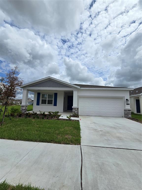 1767 Foreman Road Eagle Lake, FL 33839 - Photo 1 of 30 a front view of house with yard