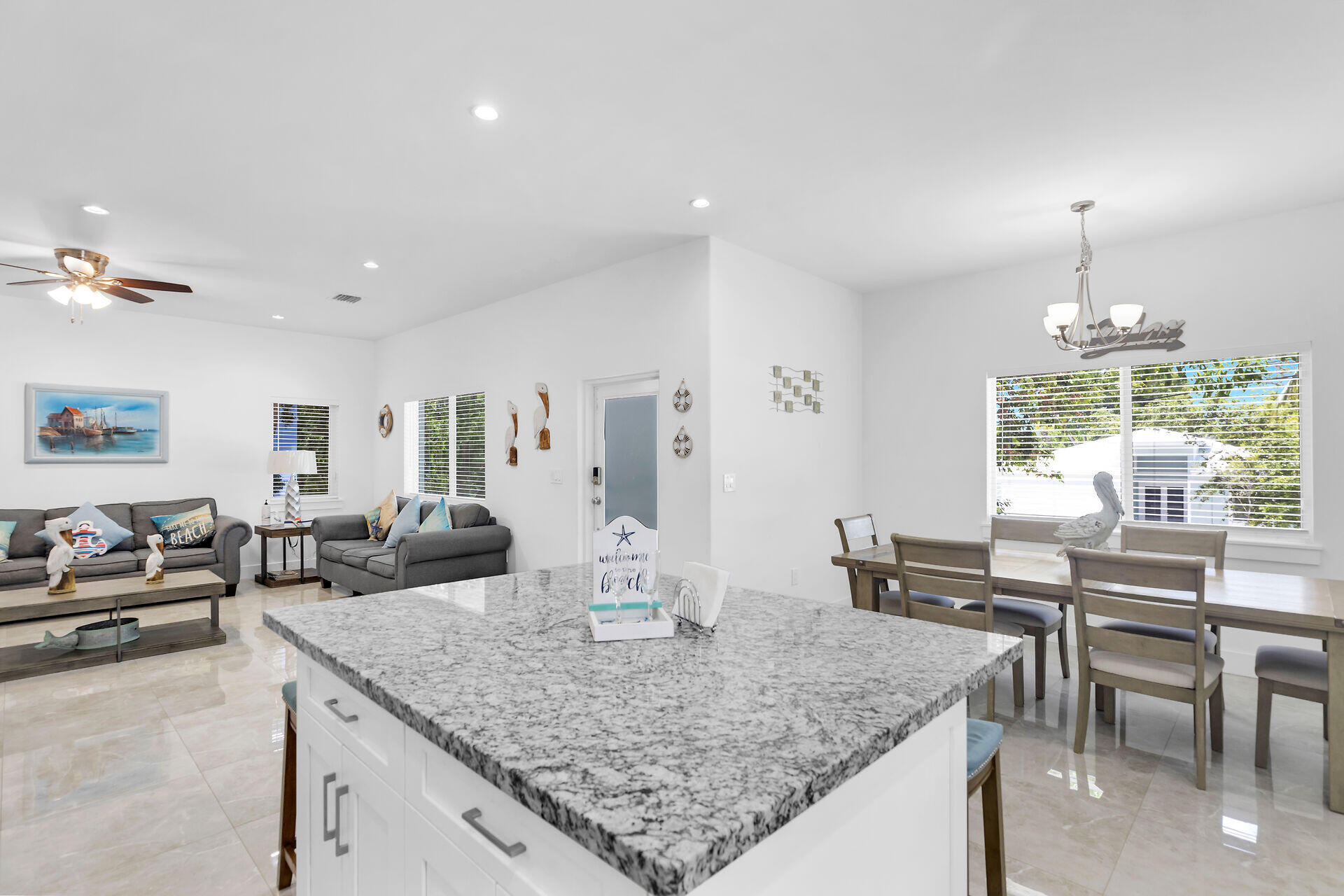 667 Colson Drive Key Largo, FL 33037 - Photo 11 of 48 a view of a dining room with furniture