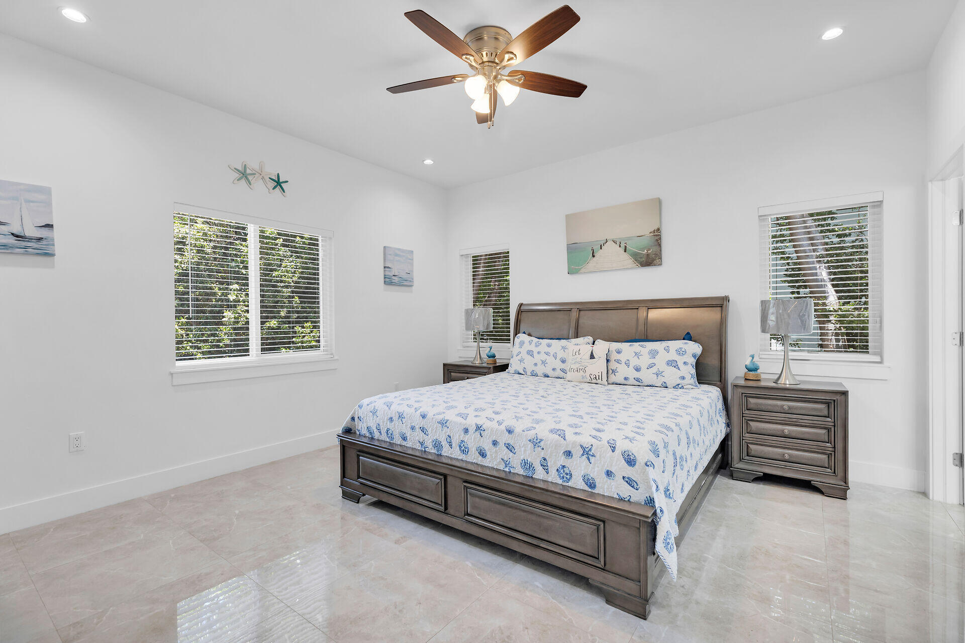 667 Colson Drive Key Largo, FL 33037 - Photo 14 of 48 a bedroom with a bed and window