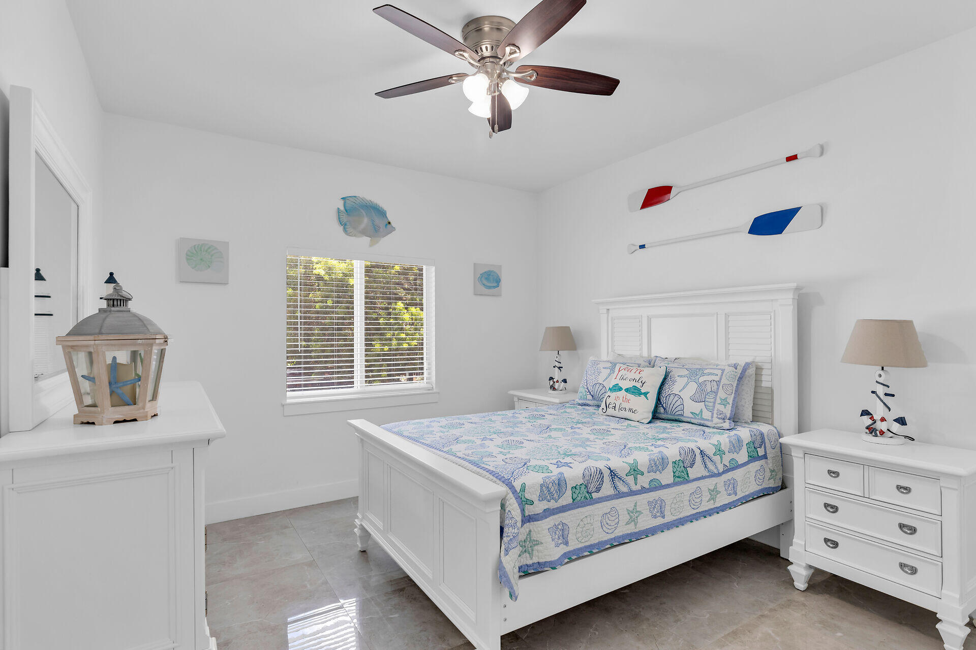 667 Colson Drive Key Largo, FL 33037 - Photo 19 of 48 a bedroom with a bed and a dresser