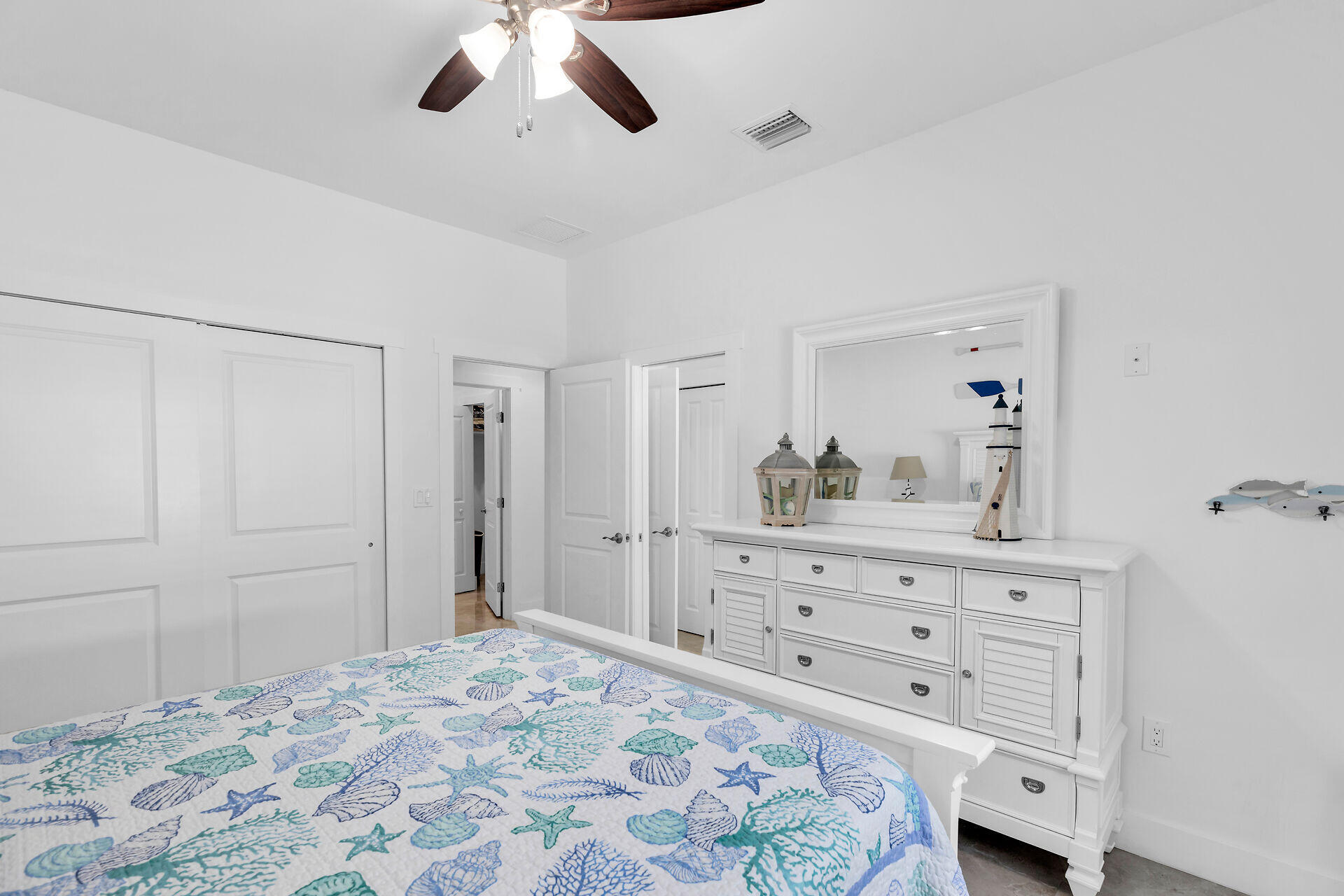 667 Colson Drive Key Largo, FL 33037 - Photo 21 of 48 a bedroom with a bed and a dresser