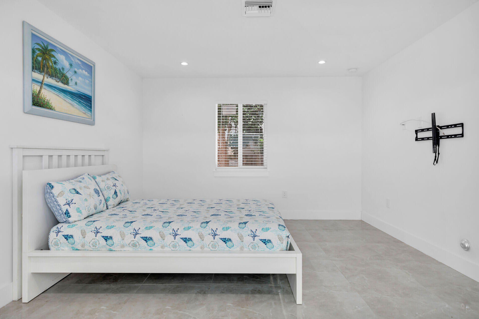 667 Colson Drive Key Largo, FL 33037 - Photo 28 of 48 a bedroom with a bed and a window