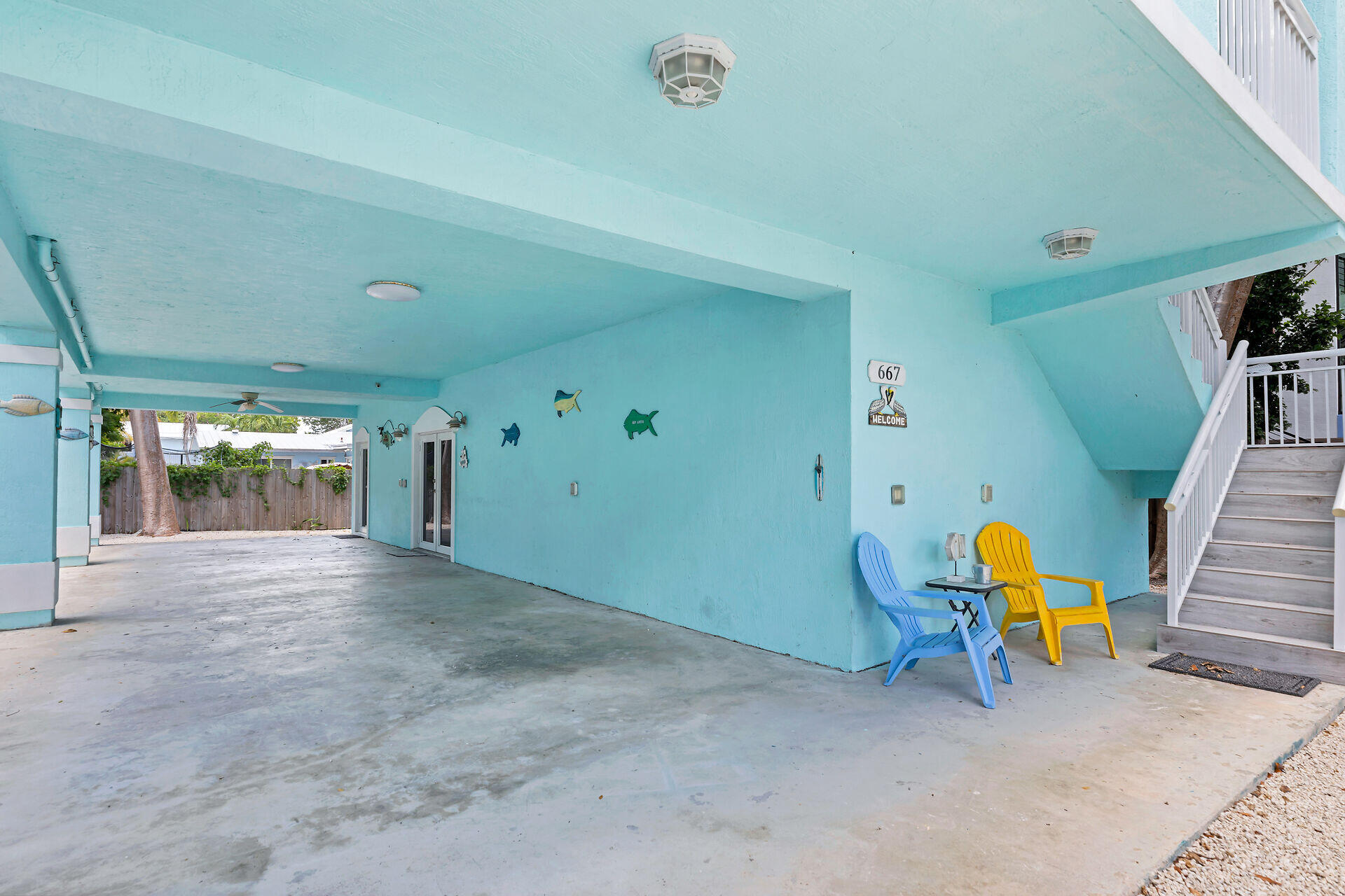 667 Colson Drive Key Largo, FL 33037 - Photo 3 of 48 a view of a room with furniture and windows