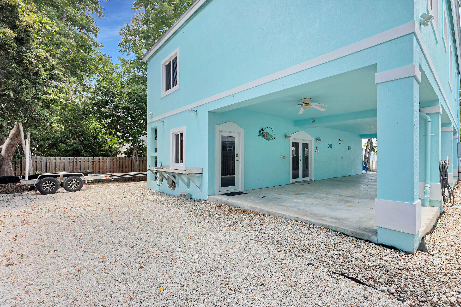 667 Colson Drive Key Largo, FL 33037 - Photo 35 of 48 a view of a house with backyard space