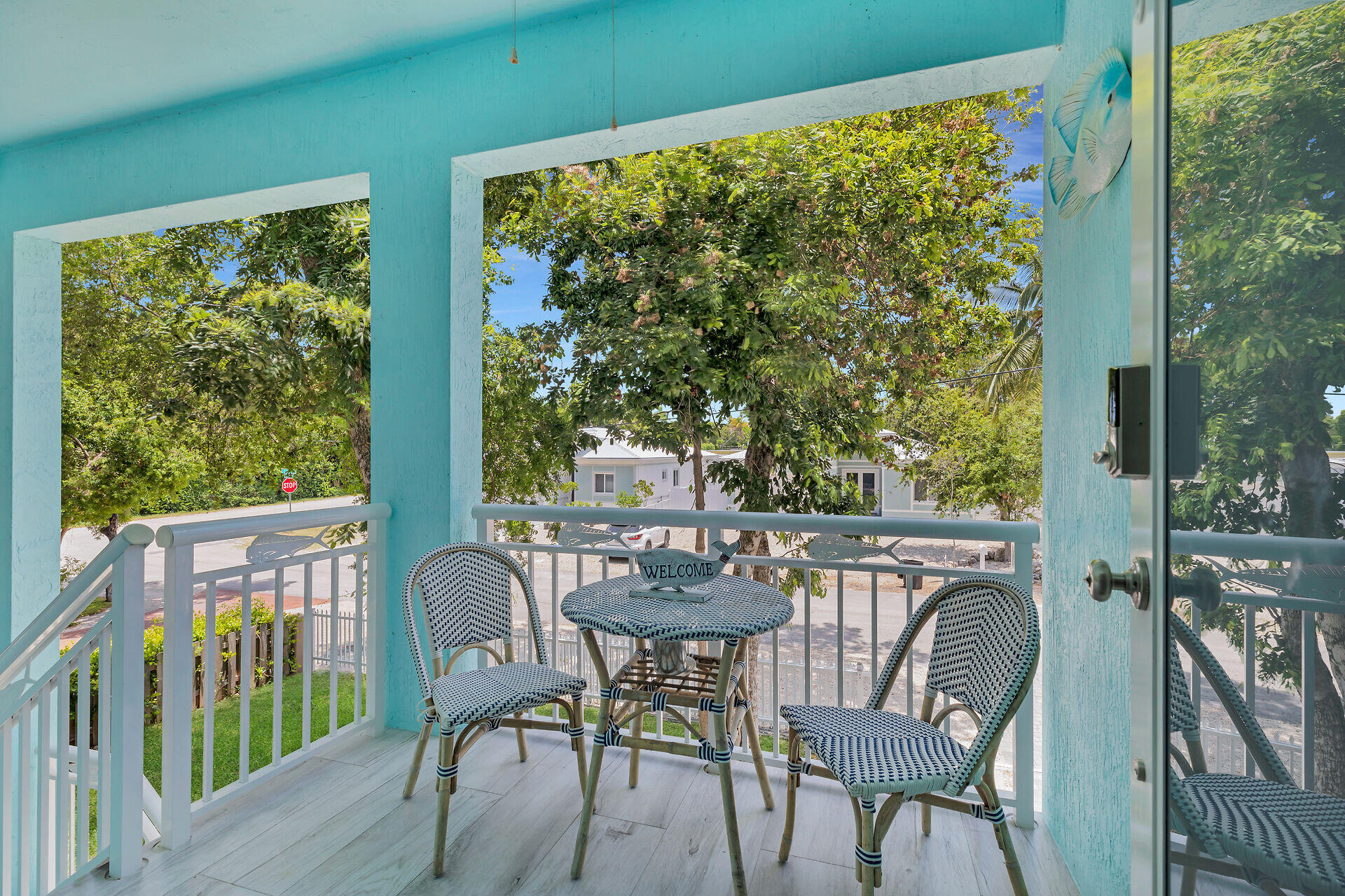 667 Colson Drive Key Largo, FL 33037 - Photo 4 of 48 a view of a chairs and table in patio