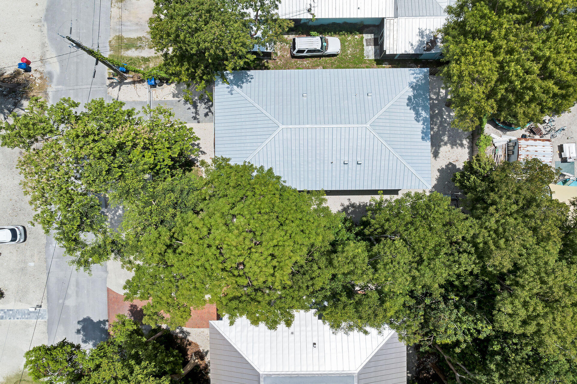 667 Colson Drive Key Largo, FL 33037 - Photo 42 of 48 an aerial view of a house with a yard and garden