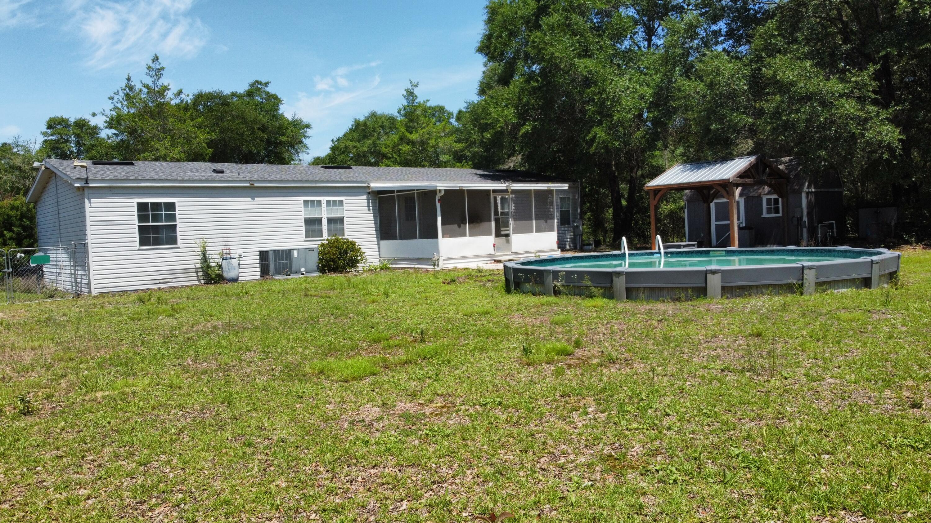 20010 Deep Springs Road Fountain, FL 32438 - Photo 17 of 21 DEEPSPRINGS BACKYARD