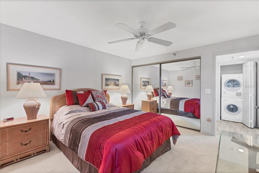 11000 Placida Road, Unit 1604 Placida, FL 33946 - Photo 22 of 42 a spacious bedroom with a bed and closet