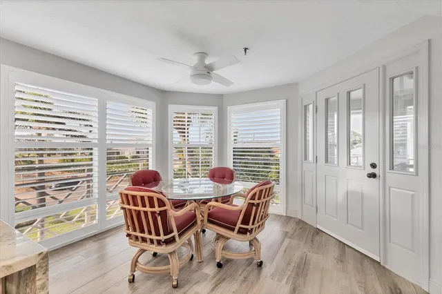 a kitchen with stainless steel appliances granite countertop a sink and stove