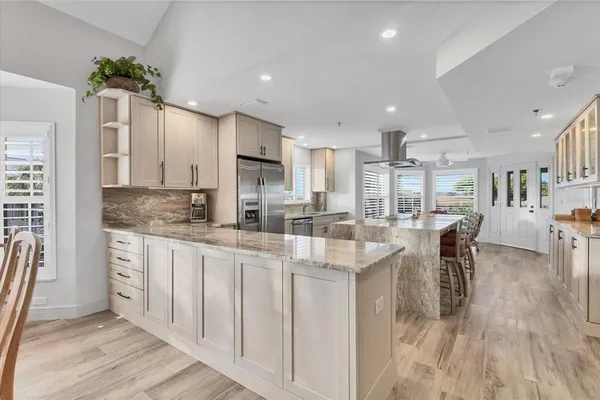 a kitchen with counter space and appliances
