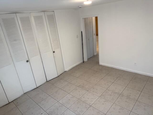 1050 East Sample Road, Unit 101 Pompano Beach, FL 33064 - Photo 15 of 24 a view of an empty room