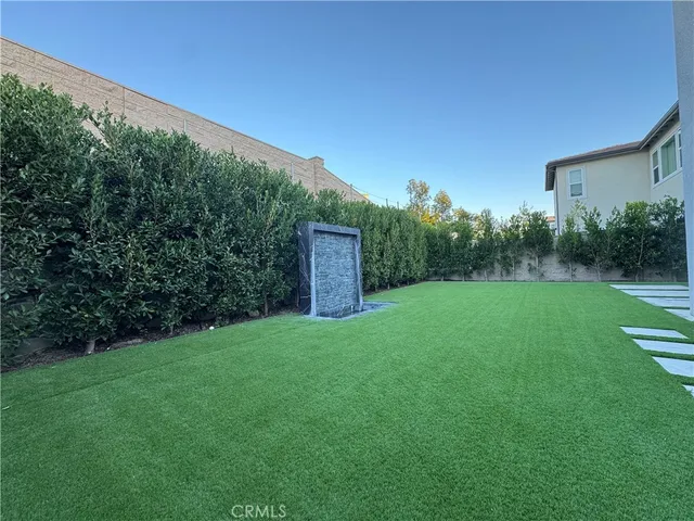 a view of a backyard with a garden