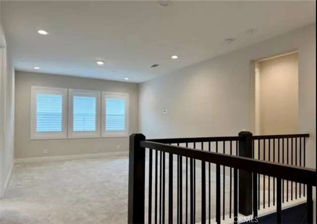 a view of hallway with a window