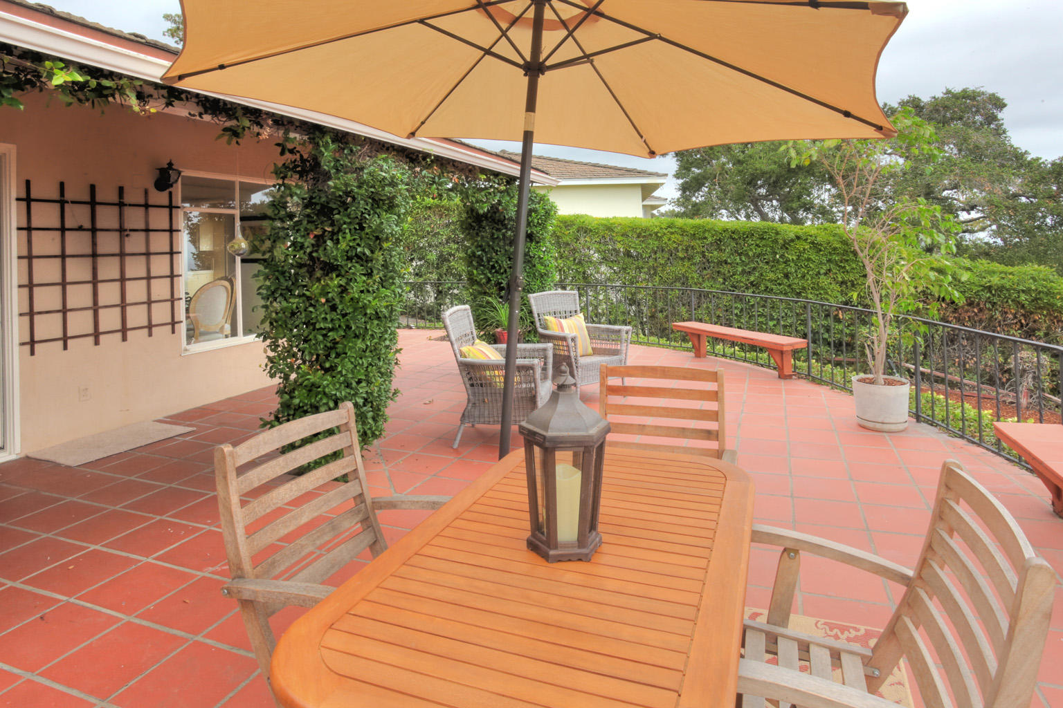 1605 Paterna Road Santa Barbara, CA 93103 - Photo 19 of 26 a view of a patio with couches table and chairs