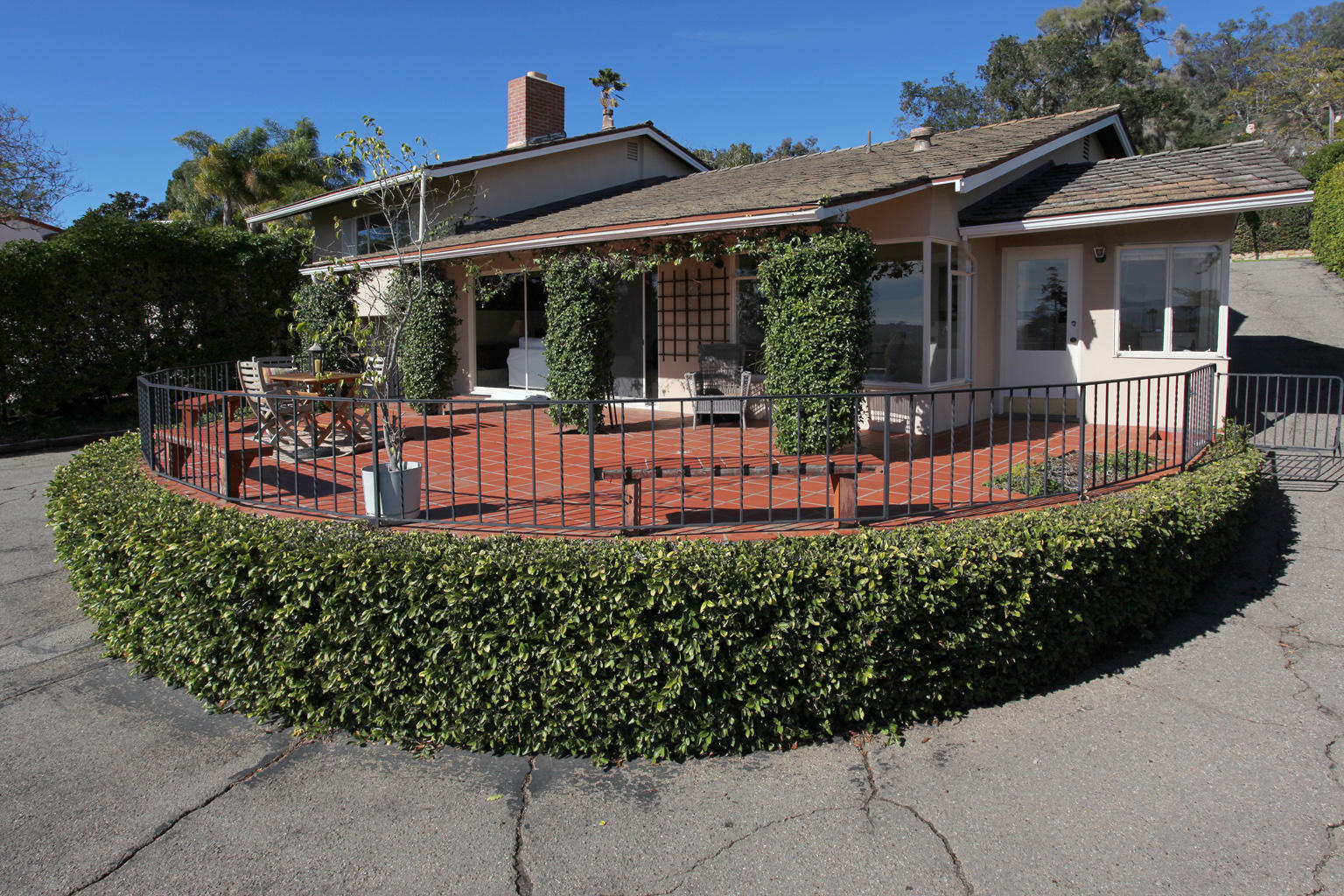 1605 Paterna Road Santa Barbara, CA 93103 - Photo 3 of 26 front view of a house with a garden