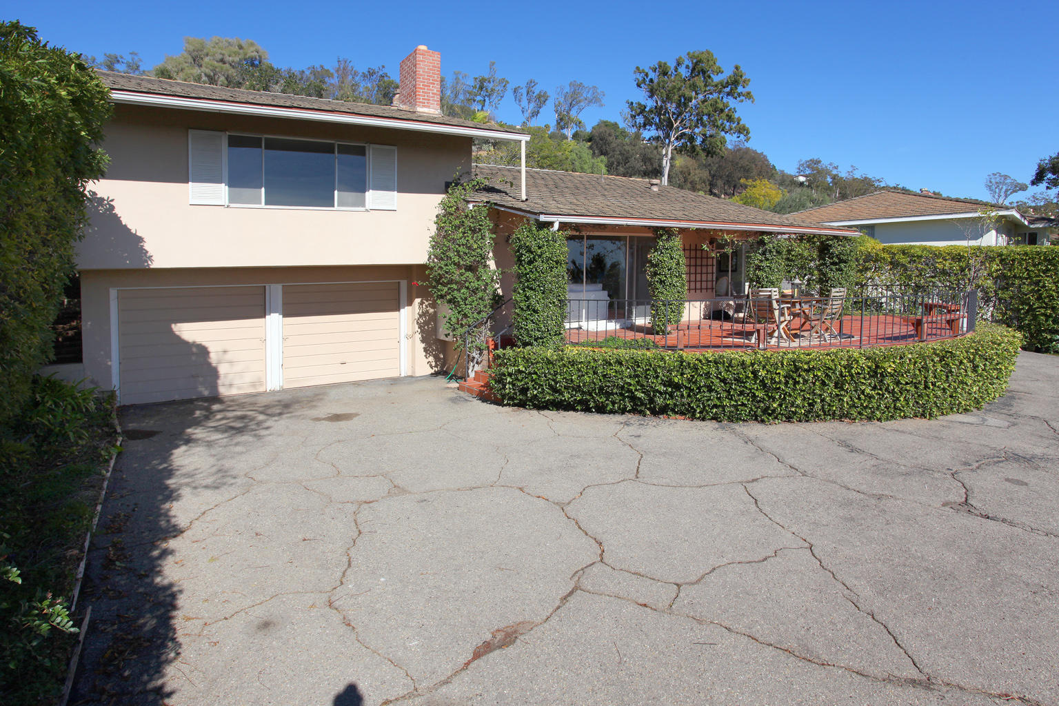 1605 Paterna Road Santa Barbara, CA 93103 - Photo 4 of 26 a front view of a house with a yard