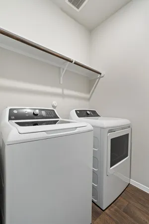 a utility room with dryer and washer