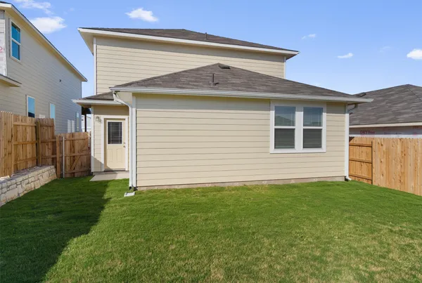 a front view of house with yard