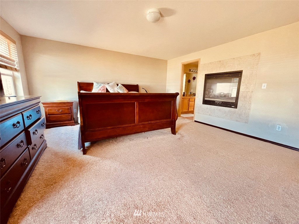 502 South 53rd Place Renton, WA 98055 - Photo 15 of 23 a view of workspace with furniture and window