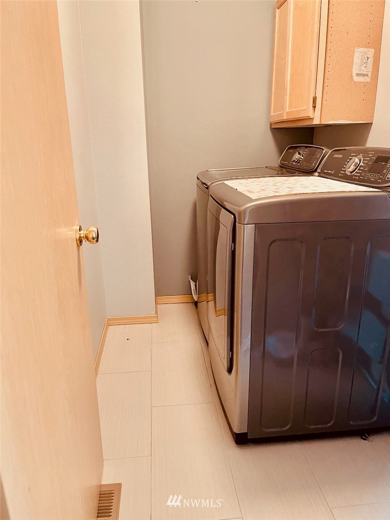 502 South 53rd Place Renton, WA 98055 - Photo 22 of 23 a utility room with a sink