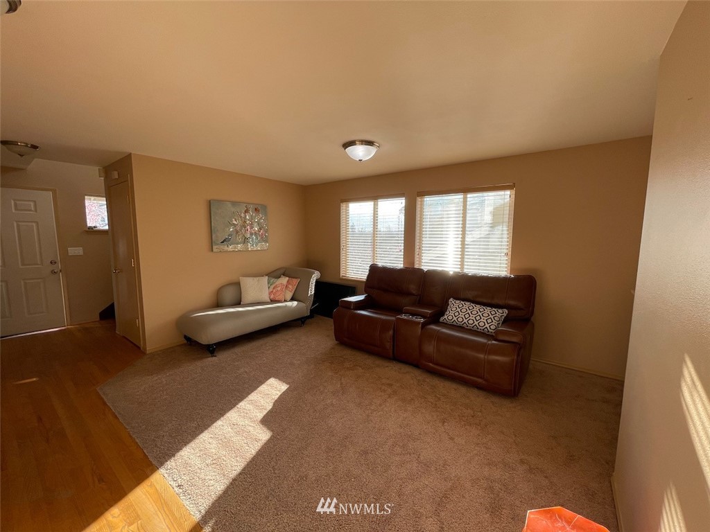 502 South 53rd Place Renton, WA 98055 - Photo 9 of 23 a living room with a couch and a couch