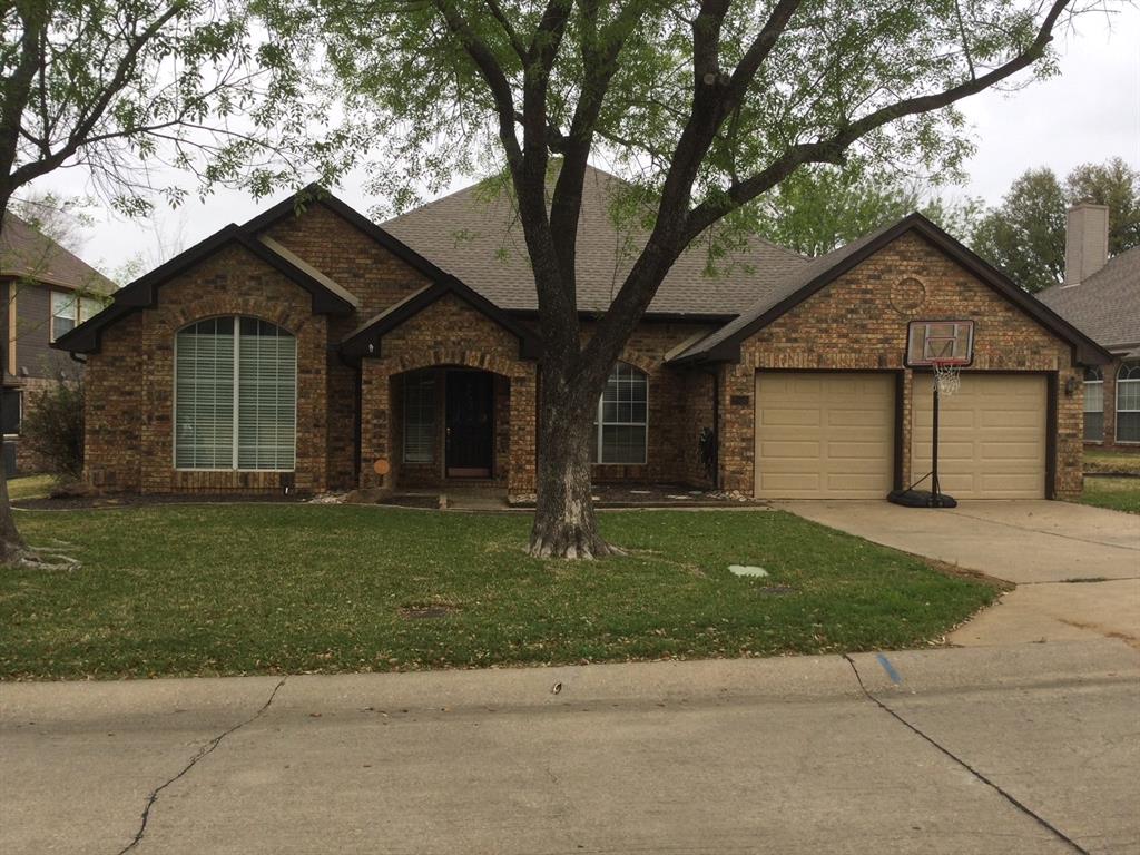 2550 Rosedale Street Highland Village, TX 75077 - Photo 1 of 1 a front view of a house with a garden