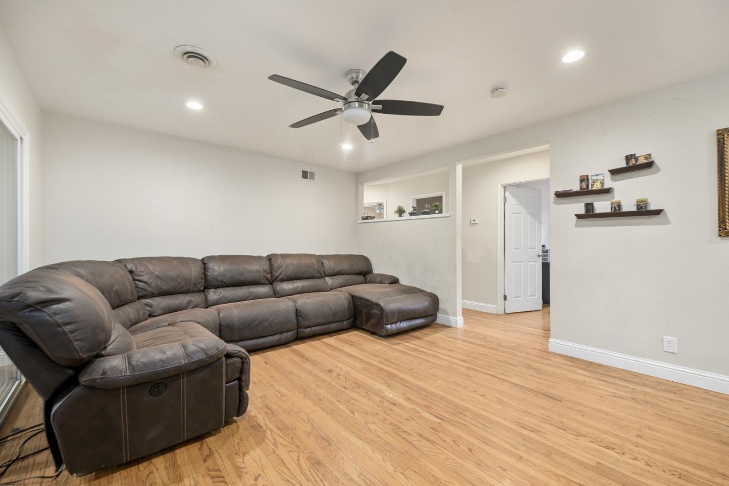 1481 Kooser Road San Jose, CA 95118 - Photo 3 of 16 a living room with furniture and a ceiling fan
