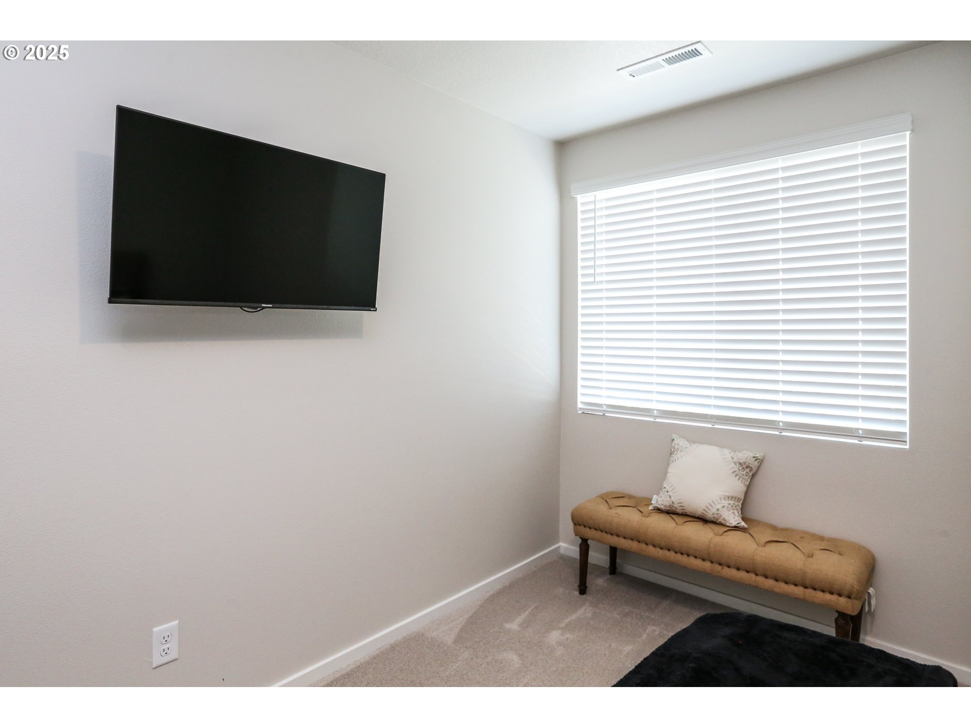 2685 V Street Springfield, OR 97477 - Photo 19 of 22 a living room with a flat screen tv and a window