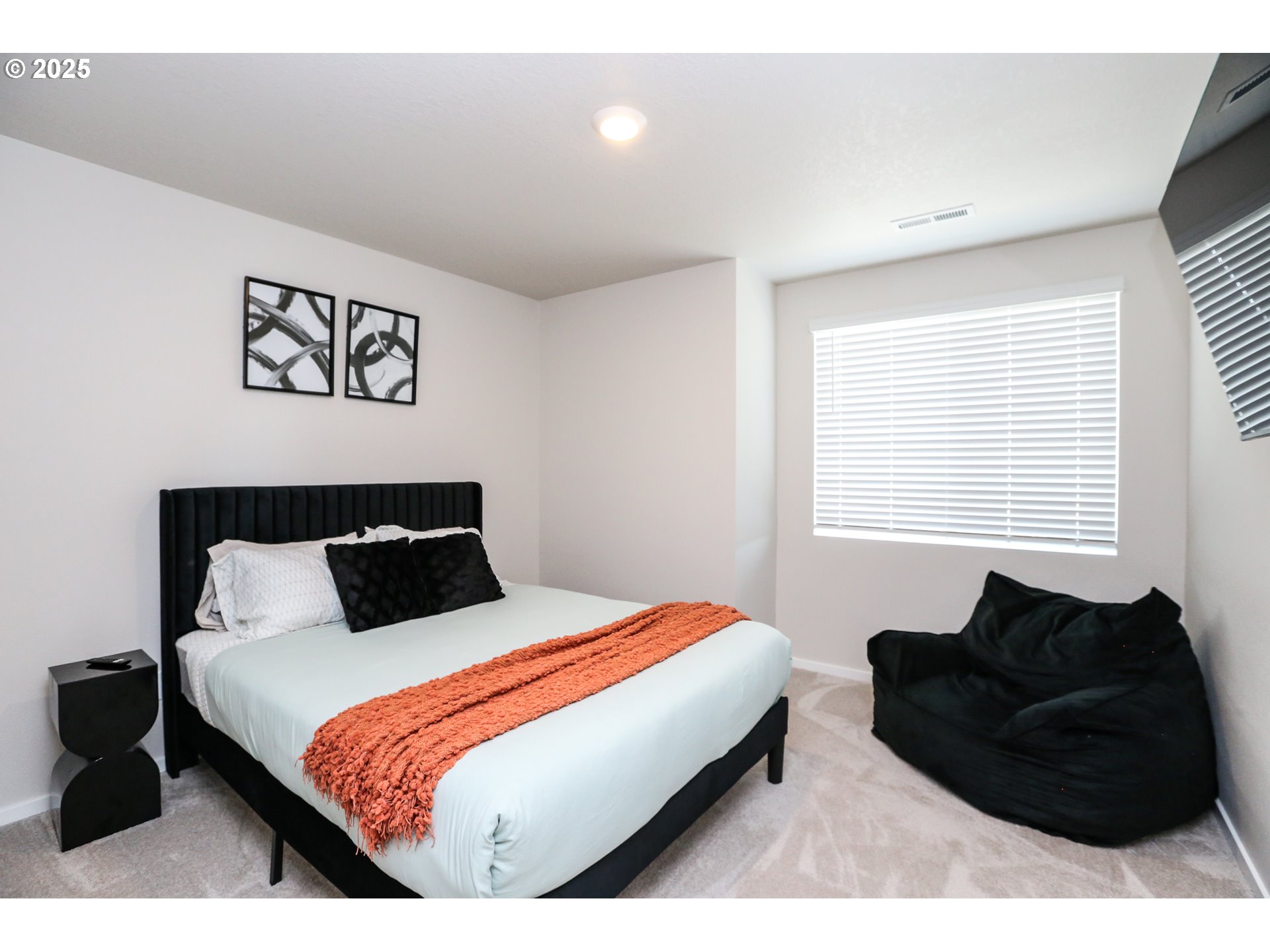 2685 V Street Springfield, OR 97477 - Photo 20 of 22 a bedroom with a bed window and couch
