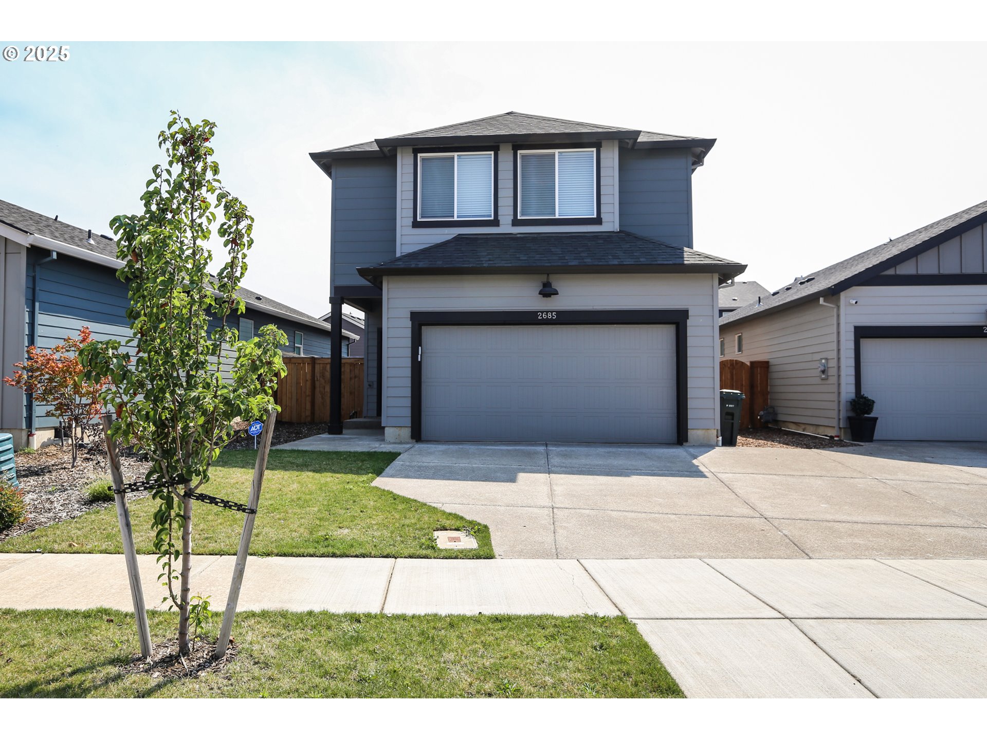 2685 V Street Springfield, OR 97477 - Photo 2 of 22 a house view with a garden space