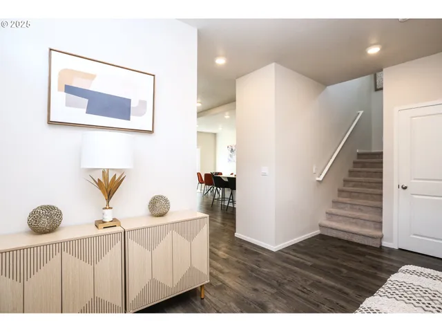 a view of entryway with wooden floor