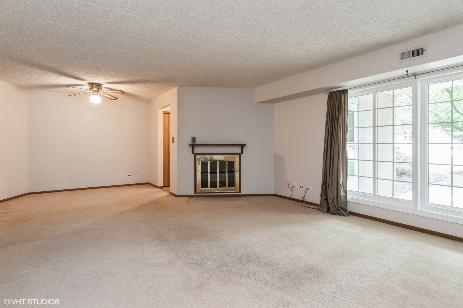 1258 Chalet Road, Unit 101 Naperville, IL 60563 - Photo 12 of 22 an empty room with windows and closet