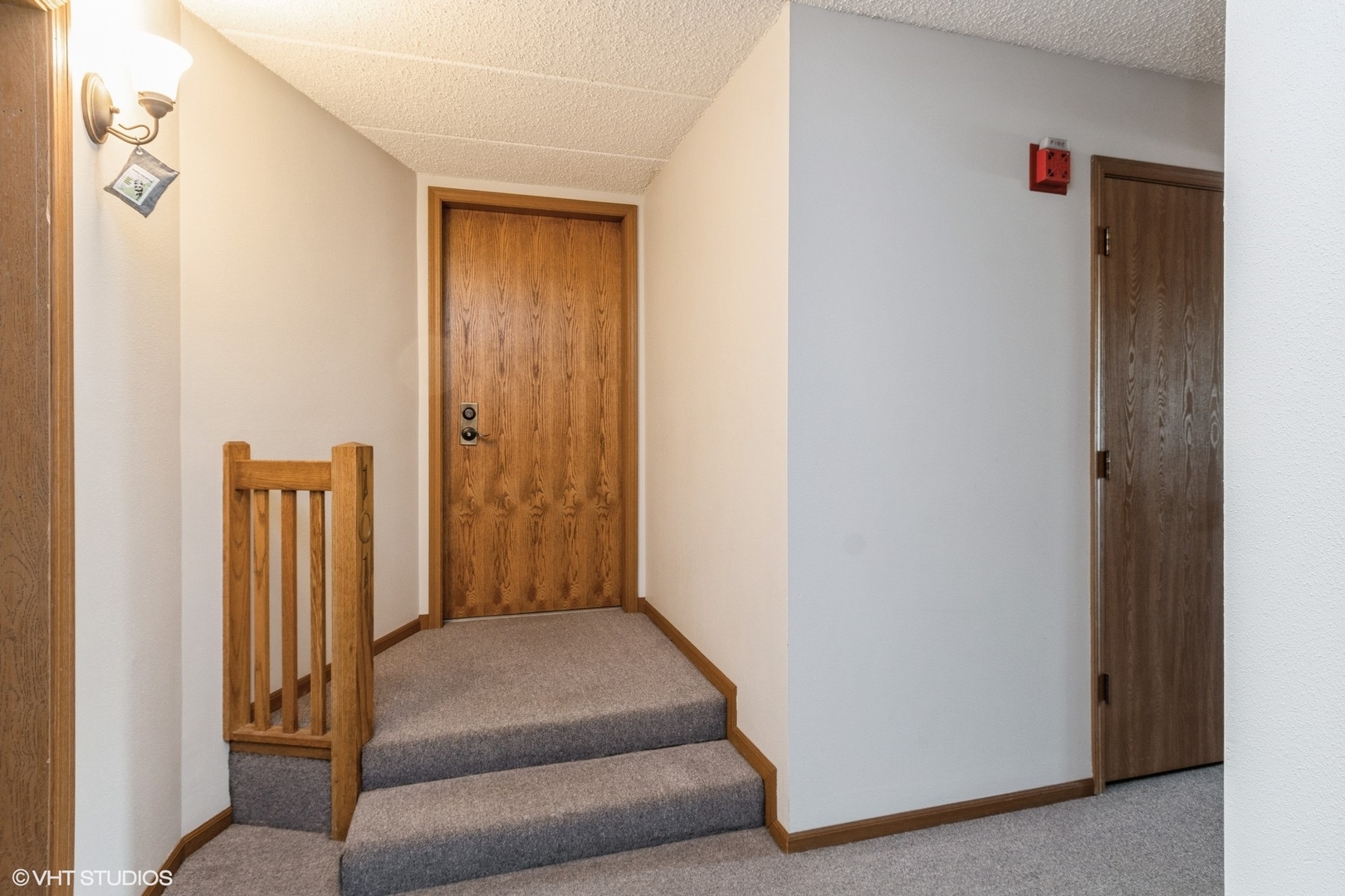 1258 Chalet Road, Unit 101 Naperville, IL 60563 - Photo 2 of 22 a view of an entryway with staircase